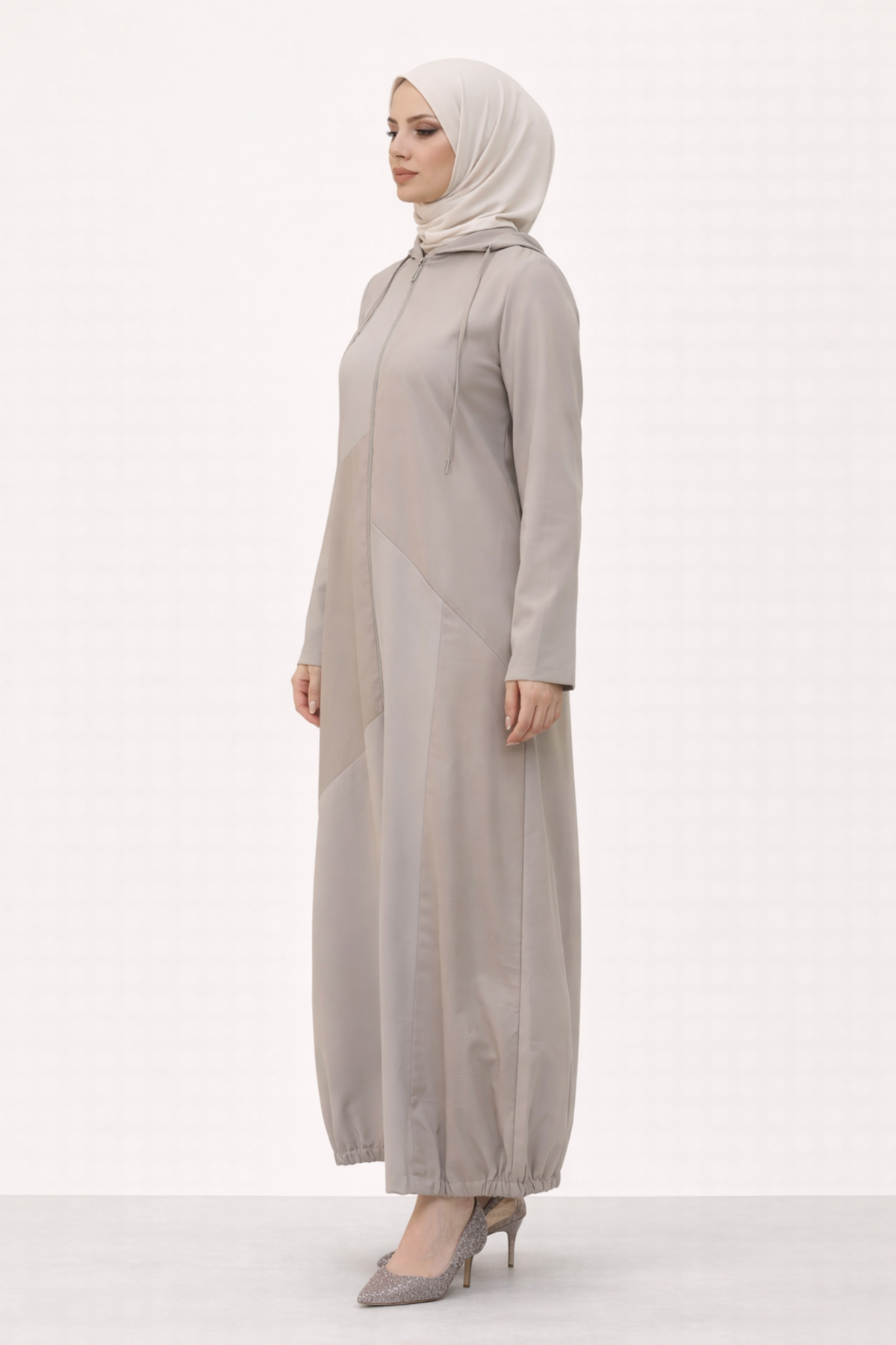 KAPŞONLU ETEĞİ BÜZGÜLÜ SPOR PERÇE KAP