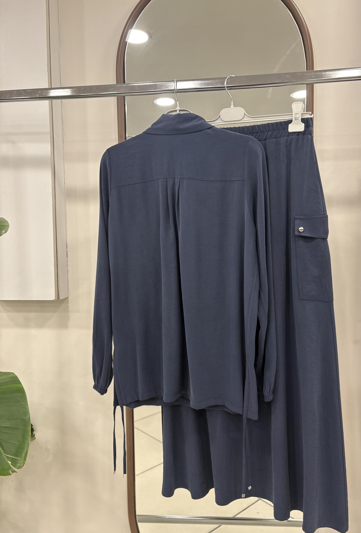 TEK CEP DÜĞMELİ ETEKLİ TAKIM